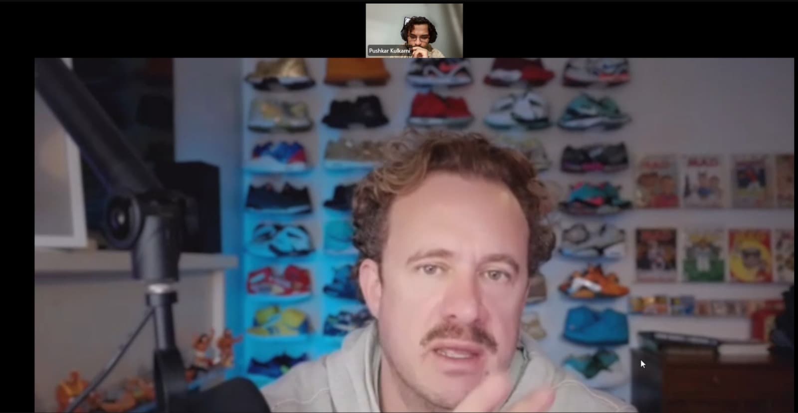 Darius Monsef mid conversation later in the same call, teammate Pushkar Kulkarni still visible in the thumbnail above